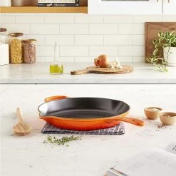 Le Creuset 11.75'' Signature Skillet - Flame 12 Le Creuset 11.75'' Signature Skillet - Flame