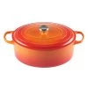 COOKWARE Le Creuset Oval 9.5-Quart Dutch Oven - Flame 1 COOKWARE Le Creuset Oval 9.5-Quart Dutch Oven - Flame