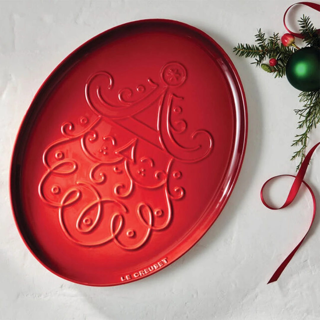 Le Creuset Noel Collection: Oval Santa Cookie Platter - Cerise W/ Embossed Design LeCreuset 4 Le Creuset Noel Collection: Oval Santa Cookie Platter - Cerise W/ Embossed Design LeCreuset
